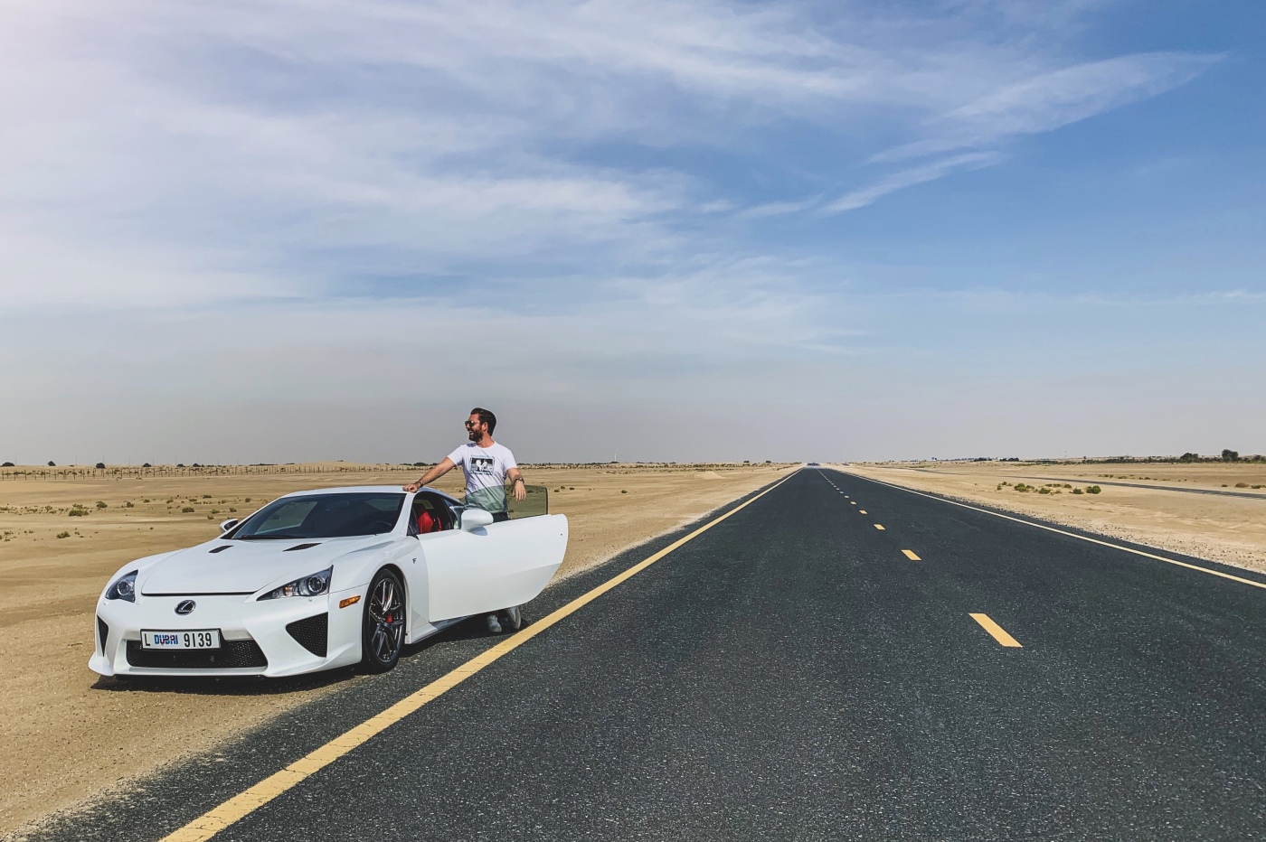 Lexus LFA stops in the Dubai desert.