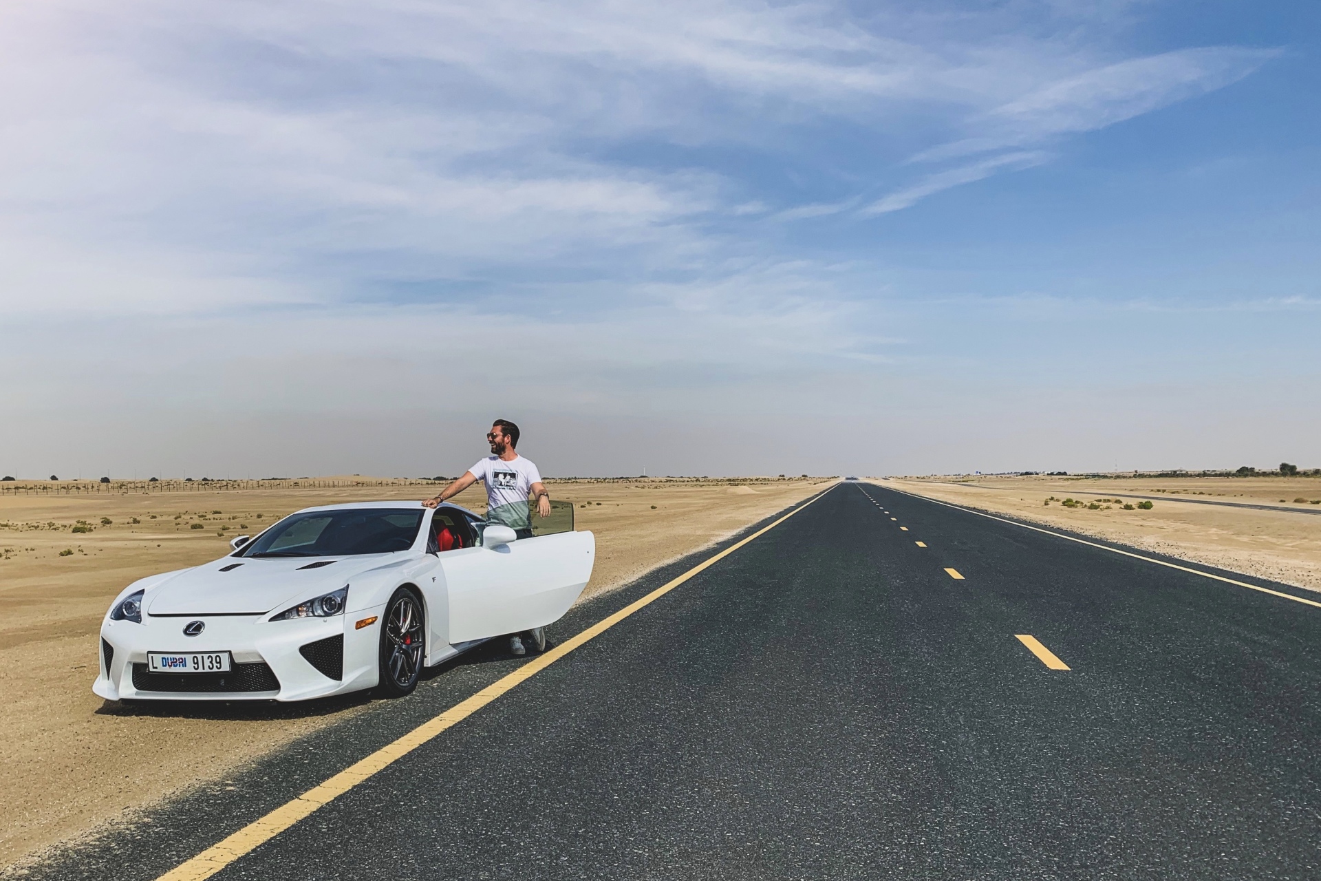 Lexus LFA stops in the Dubai desert.